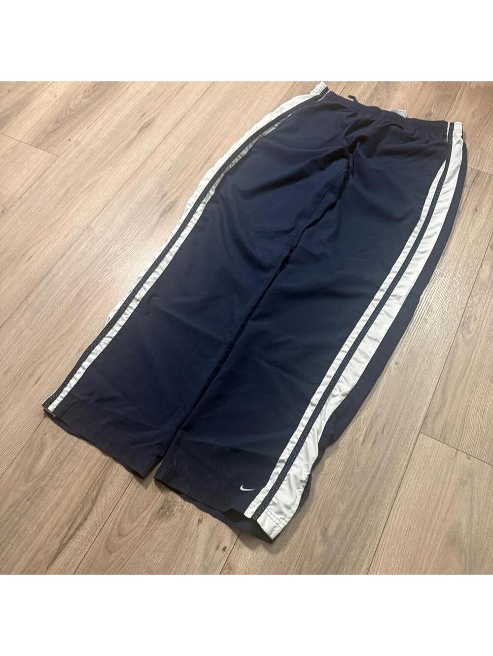 2000s Nike navy track pants with white stripes